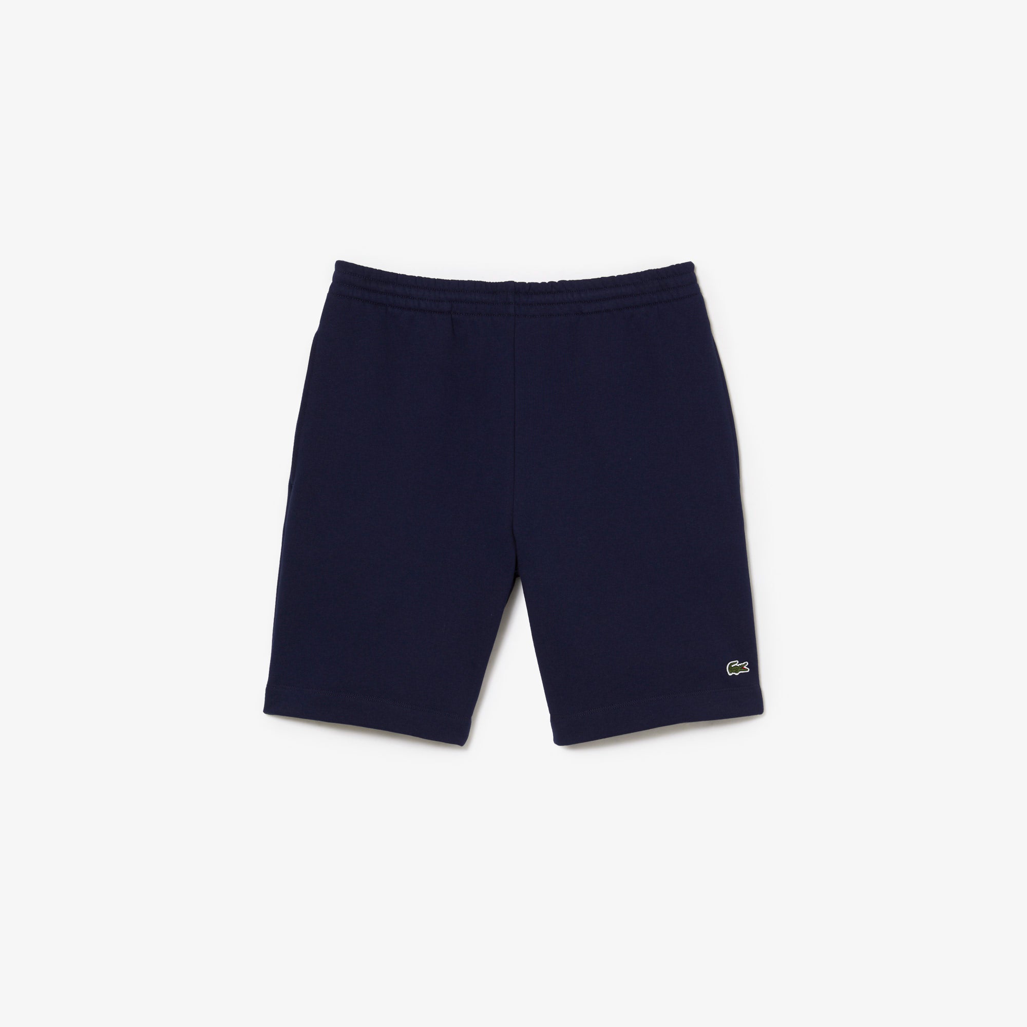 Short Lacoste bleu nuit détail poche passepoilée
