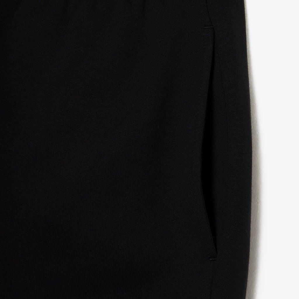 Short Lacoste noir vu de dos
