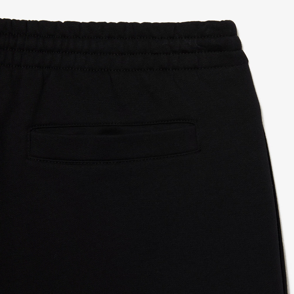 Short Lacoste noir porté
