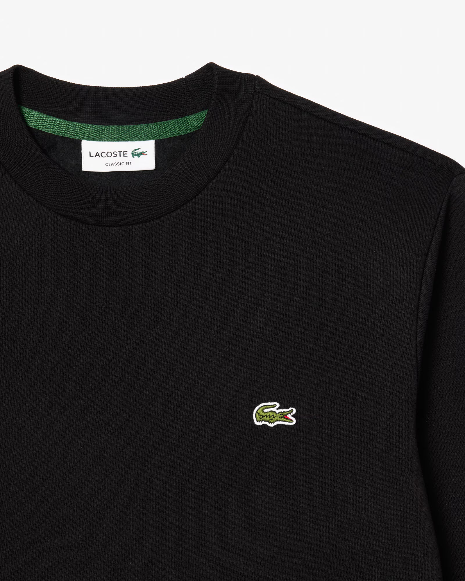 Sweat Lacoste noir détail crocodile brodé sur la poitrine
